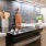 View of oven and kitchen backsplash