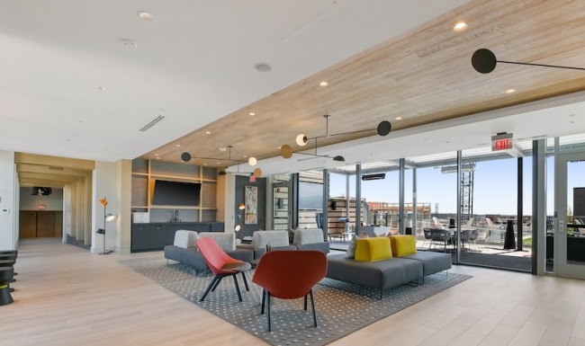 bright spacious penthouse lounge  with wall to wall windows